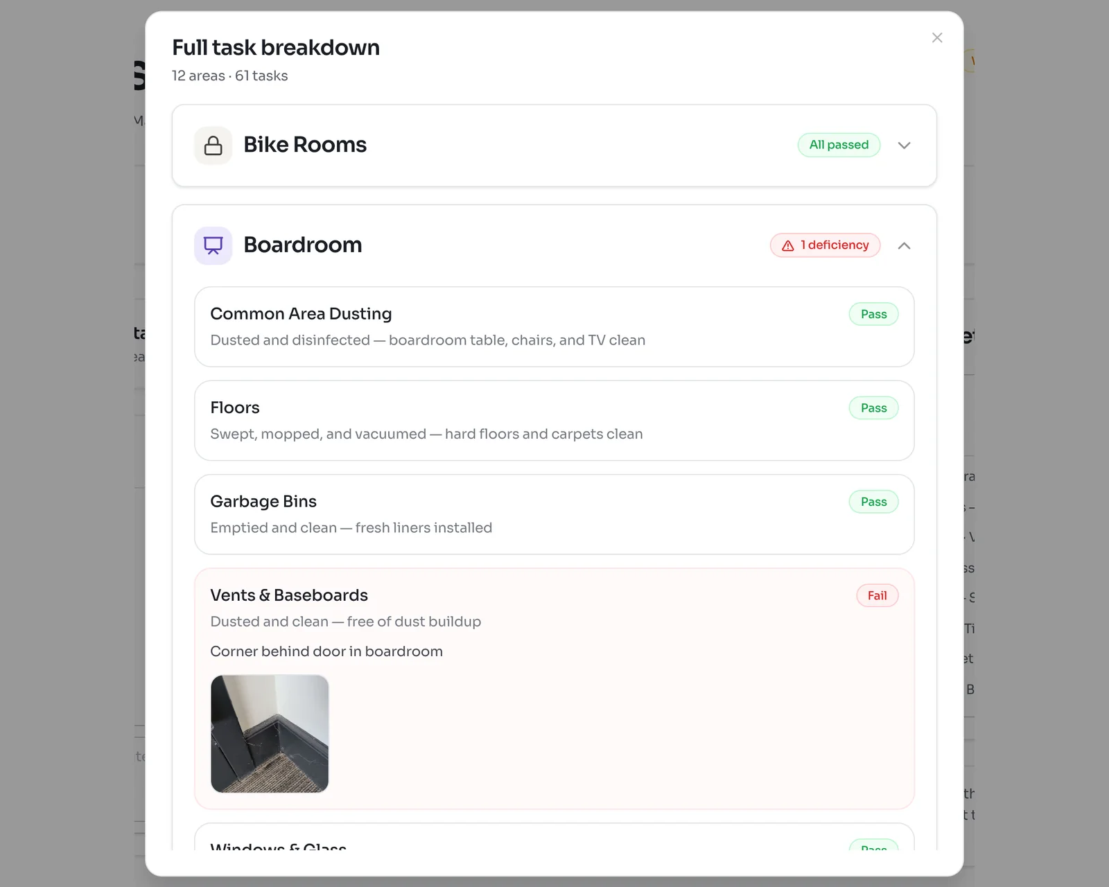Full task breakdown window with 12 areas and 61 tasks, Bike Rooms marked All passed, and Boardroom open with one failed task, Vents and Baseboards, showing a comment and a photo