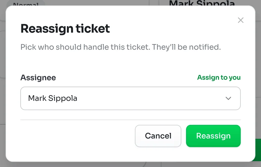 Reassign ticket window with an Assignee menu set to Mark Sippola, an Assign to you link and a Reassign button